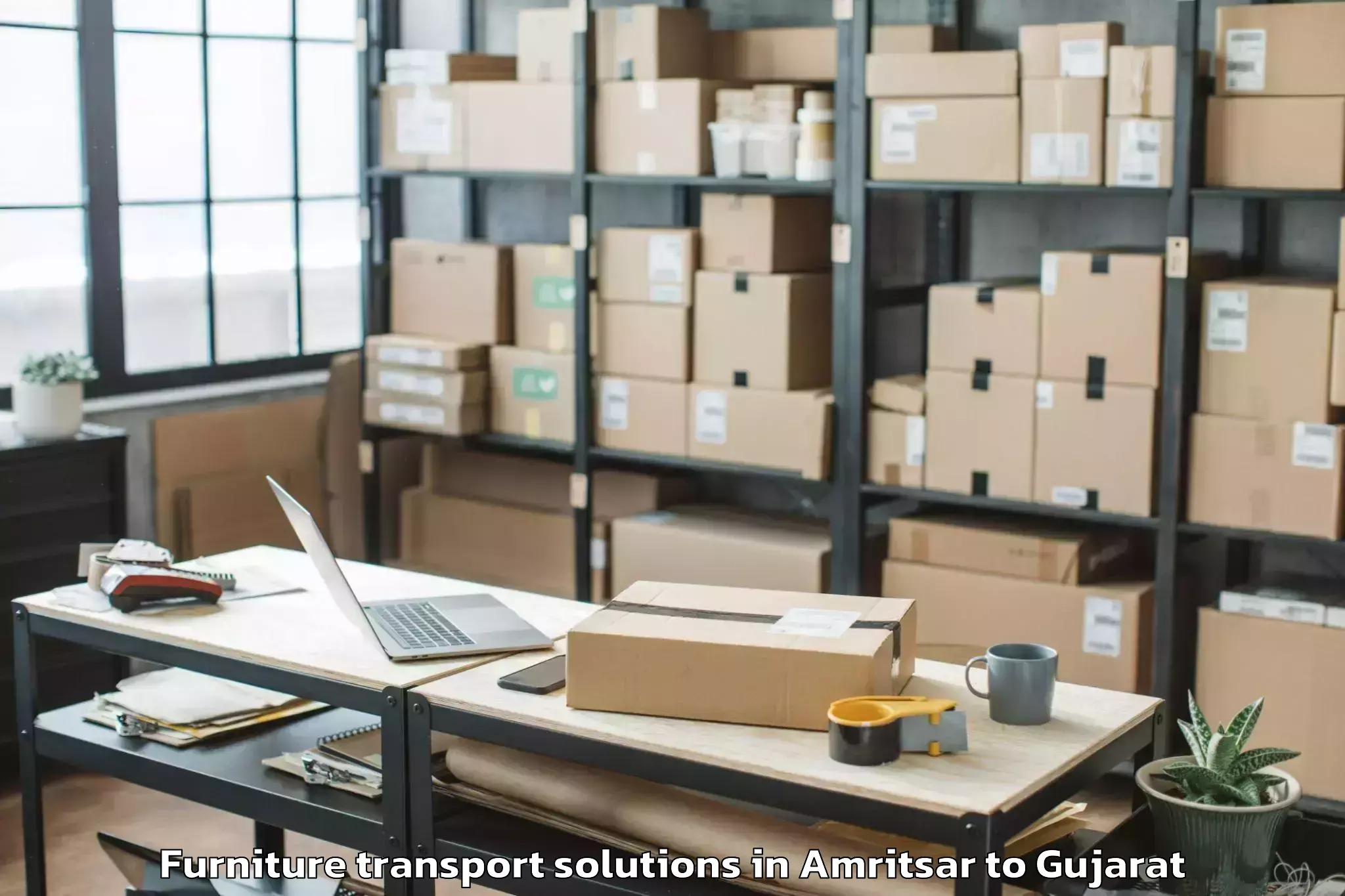 Trusted Amritsar to Gandevi Furniture Transport Solutions